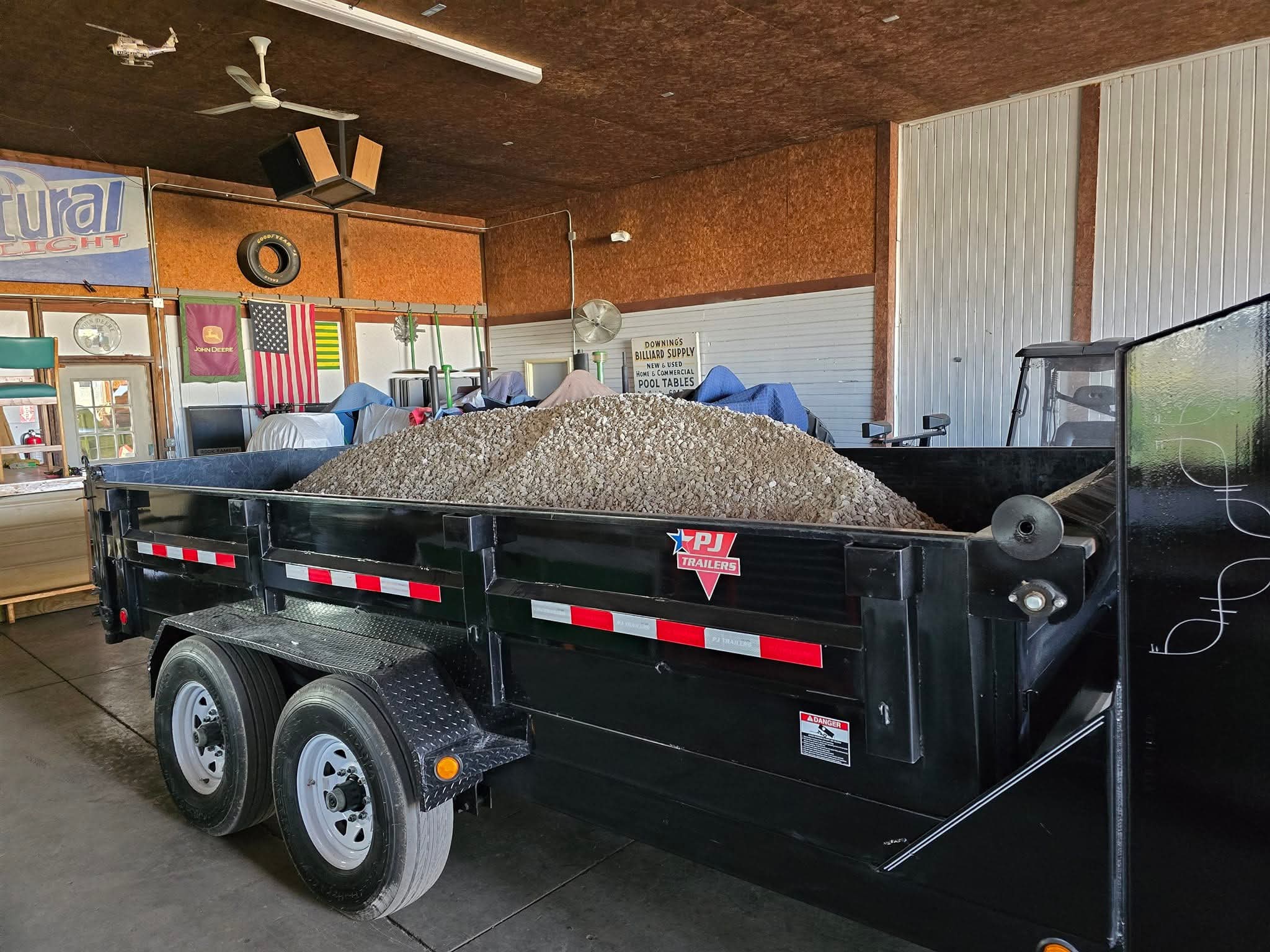 PJ dump trailer loaded with gravel